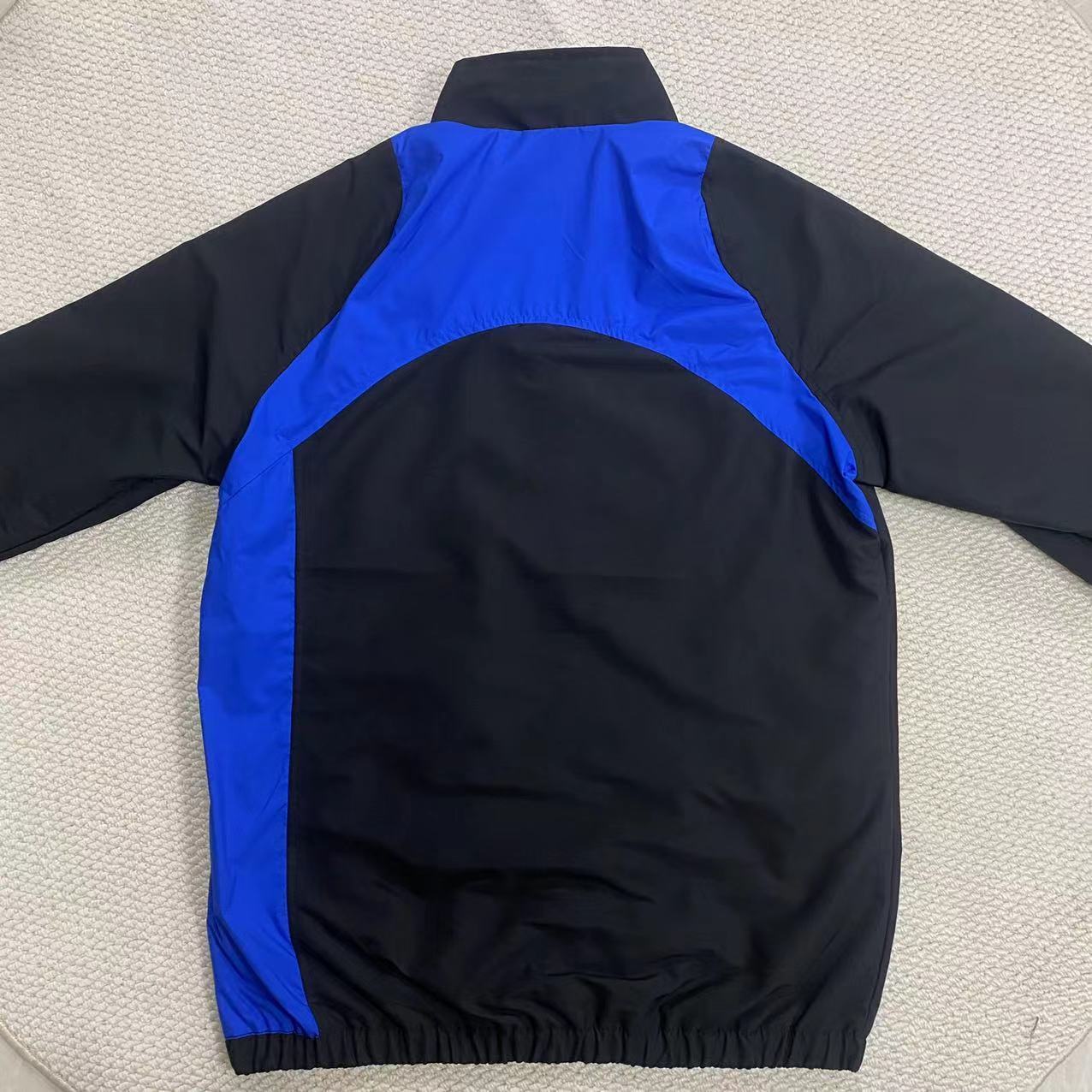 2026 Windbreaker Jacket - Black/Blue - back product view