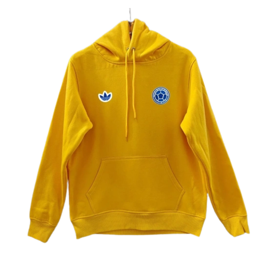 The 2026 Team Hoodie Yellow - Blue Crest brings -inspired football style into a comfortable everyday hoodie. Its clean yellow finish and blue crest details make it easy to pair with jeans, joggers, or training pieces while keeping a polished fanwear aesthetic.