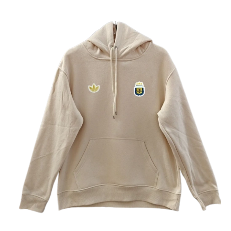 The 2026/27 Team Hoodie Beige brings -inspired football style to a comfortable everyday layer.