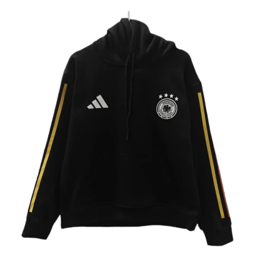 The 2026/27 Team Hoodie - Black/Yellow combines national-team style with a comfortable everyday silhouette. A black hoodie with clean yellow sleeve stripes and light chest branding. The high-contrast finish creates a sleek alternative colorway with a strong training-wear aesthetic.